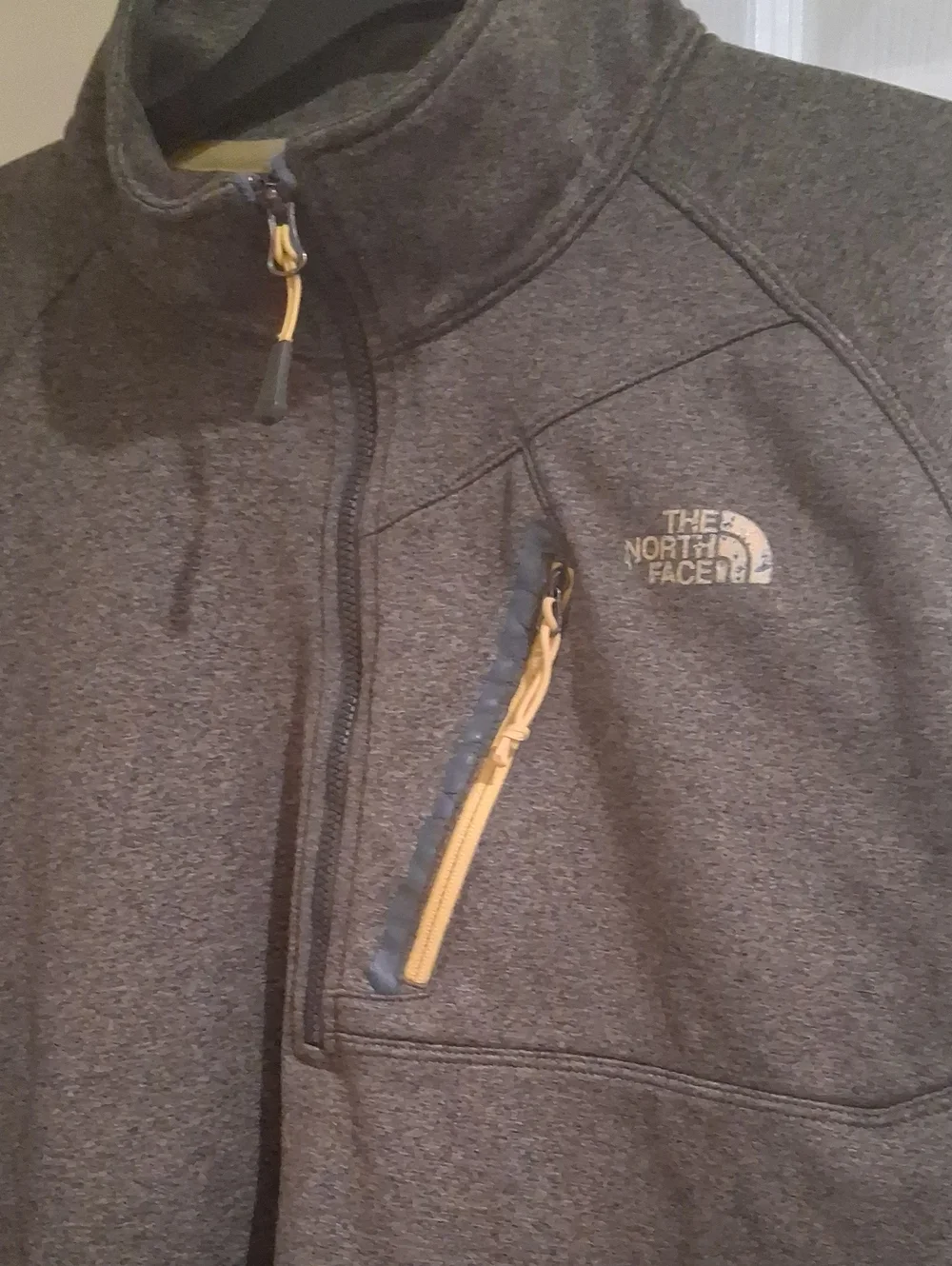 The North Face Men's Charcoal Gray Half-Zip Fleece with Yellow Accents